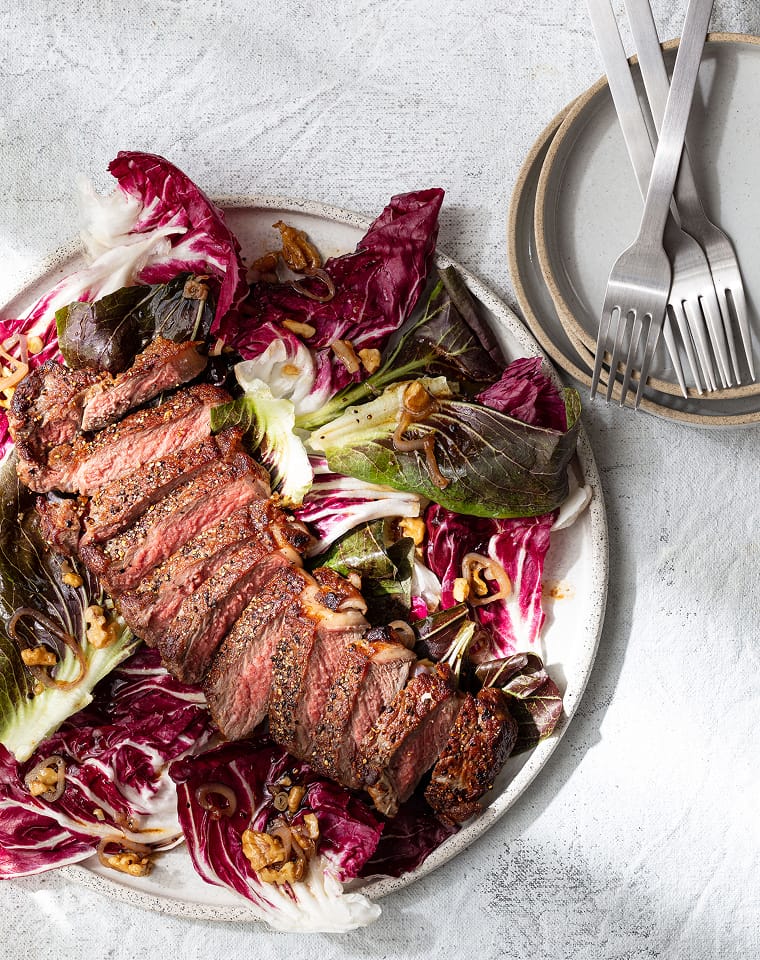 Cooked new york strip steaks